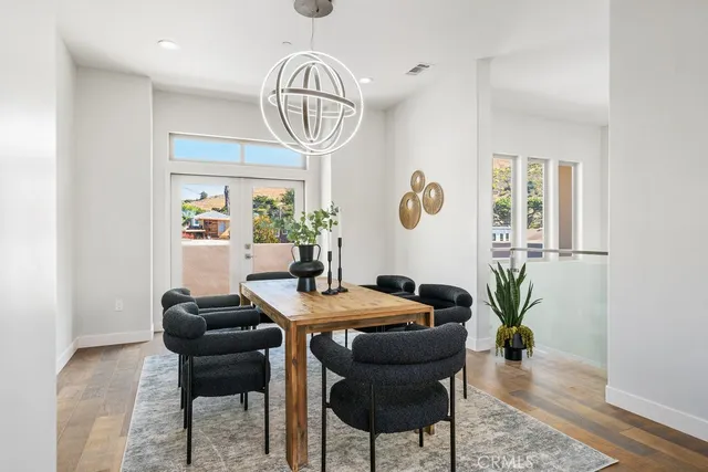 a view of entryway with wooden floor