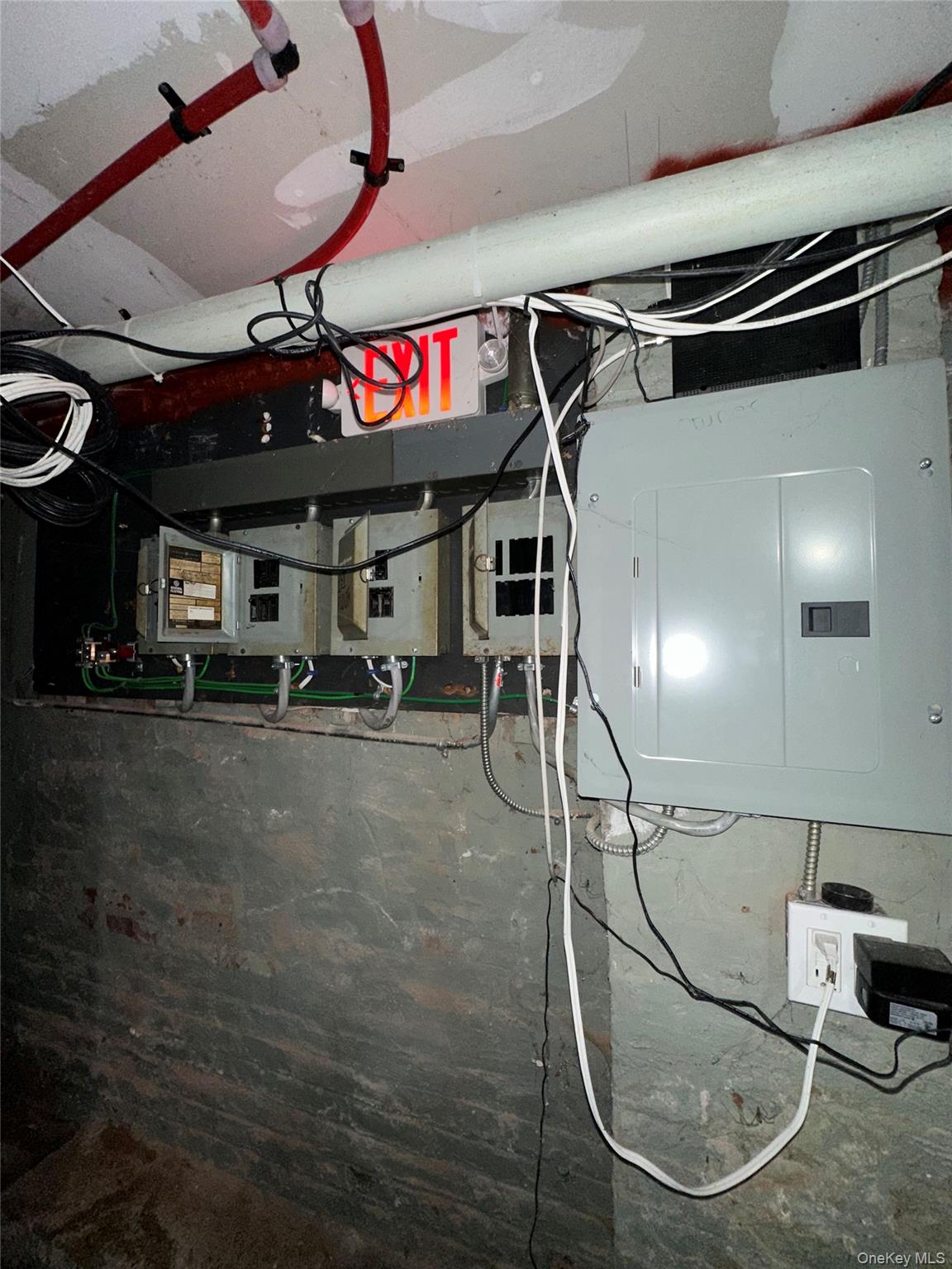 31 Victor Street Yonkers, NY 10701 - Photo 11 of 11 Unfinished below grade area with electric panel