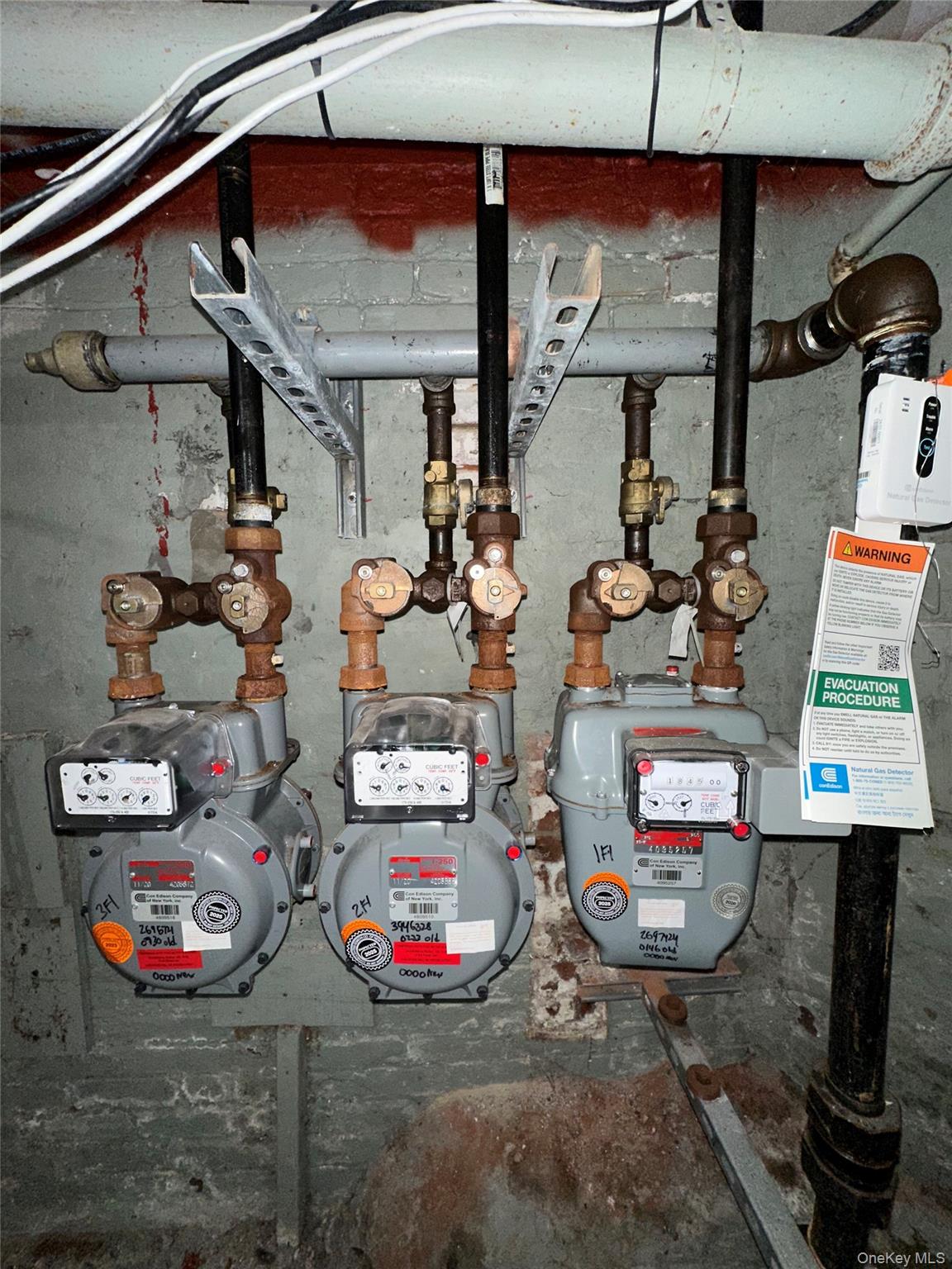 31 Victor Street Yonkers, NY 10701 - Photo 10 of 11 Utility room with gas meter