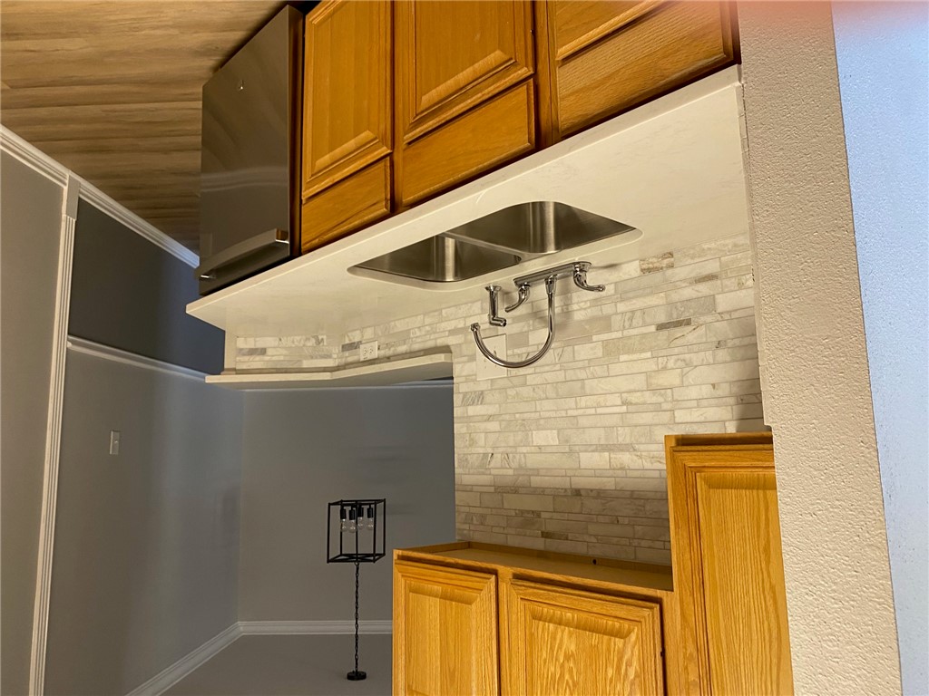 206 Fraternity Row College Station, TX 77845 - Photo 3 of 18 a kitchen with a sink and cabinets
