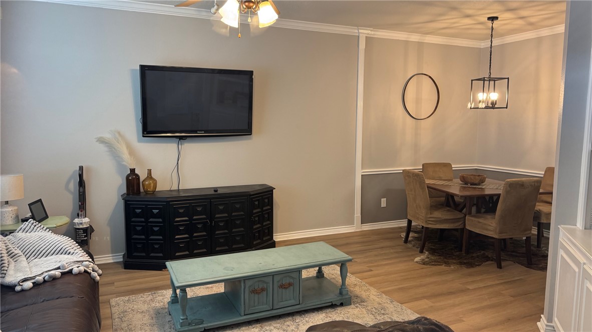206 Fraternity Row College Station, TX 77845 - Photo 5 of 18 a living room with furniture and a flat screen tv