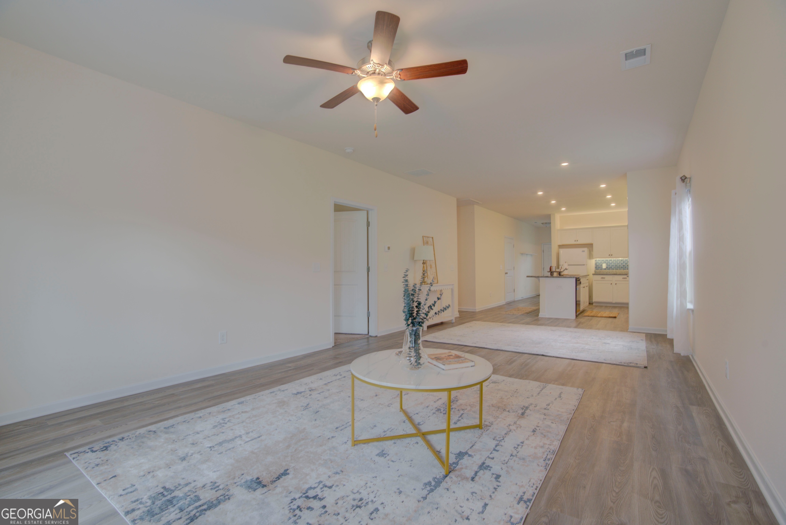 12 Applewood Drive Northeast Rome, GA 30165 - Photo 19 of 31 a living room with furniture and a chandelier