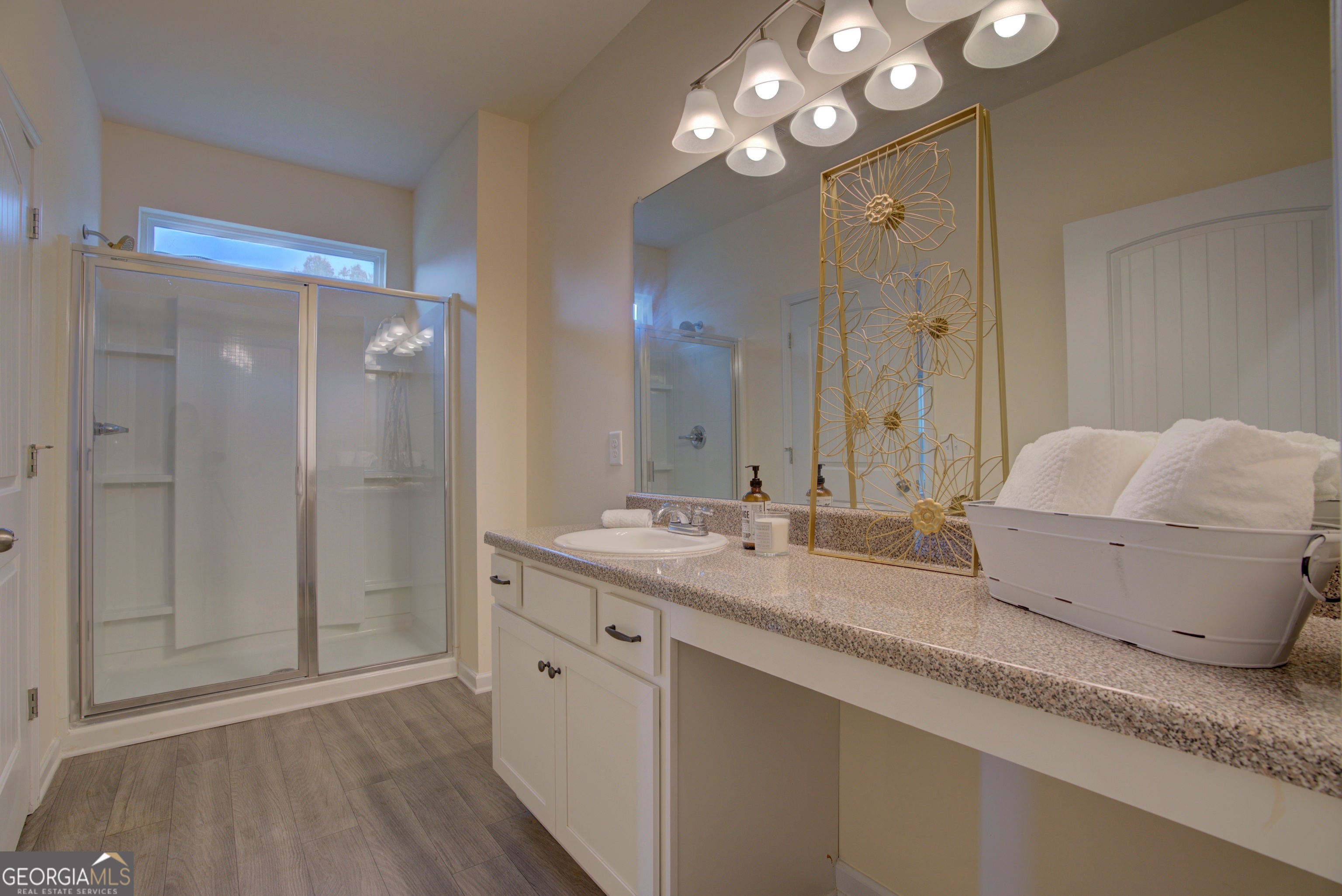 12 Applewood Drive Northeast Rome, GA 30165 - Photo 24 of 31 a spacious bathroom with a granite countertop sink a mirror and a shower