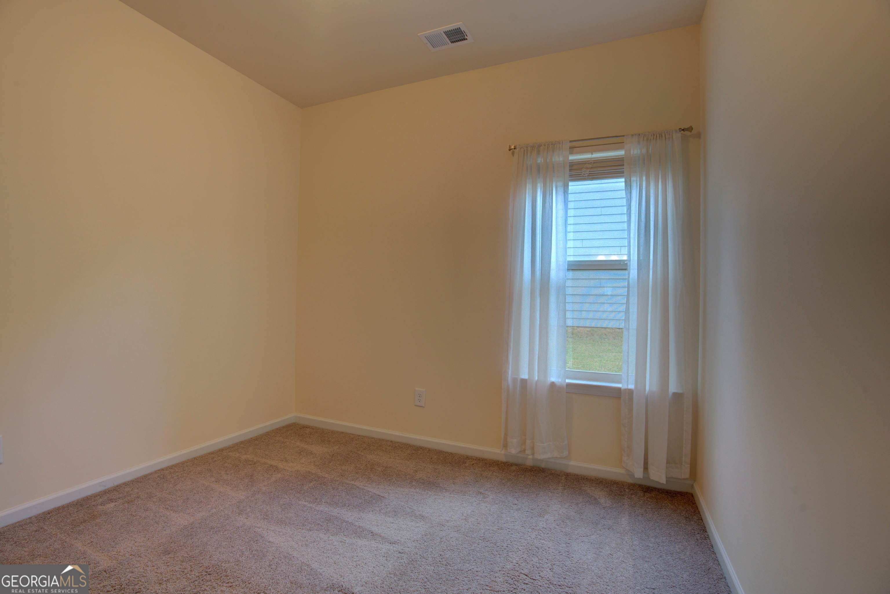 12 Applewood Drive Northeast Rome, GA 30165 - Photo 27 of 31 an empty room with a window