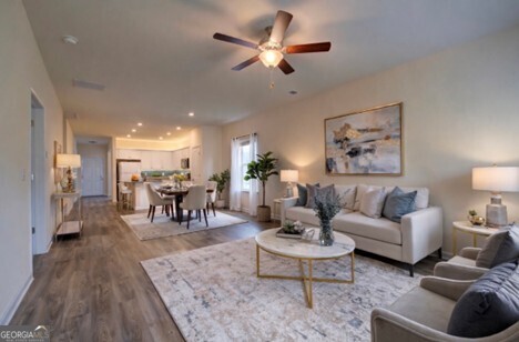 12 Applewood Drive Northeast Rome, GA 30165 - Photo 4 of 31 a living room with furniture and a wooden floor