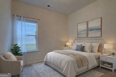 12 Applewood Drive Northeast Rome, GA 30165 - Photo 6 of 31 a bedroom with a bed and a window