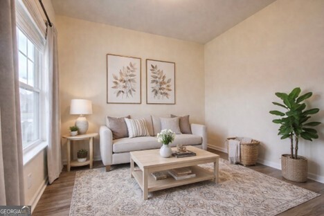 12 Applewood Drive Northeast Rome, GA 30165 - Photo 7 of 31 a living room with furniture and a potted plant