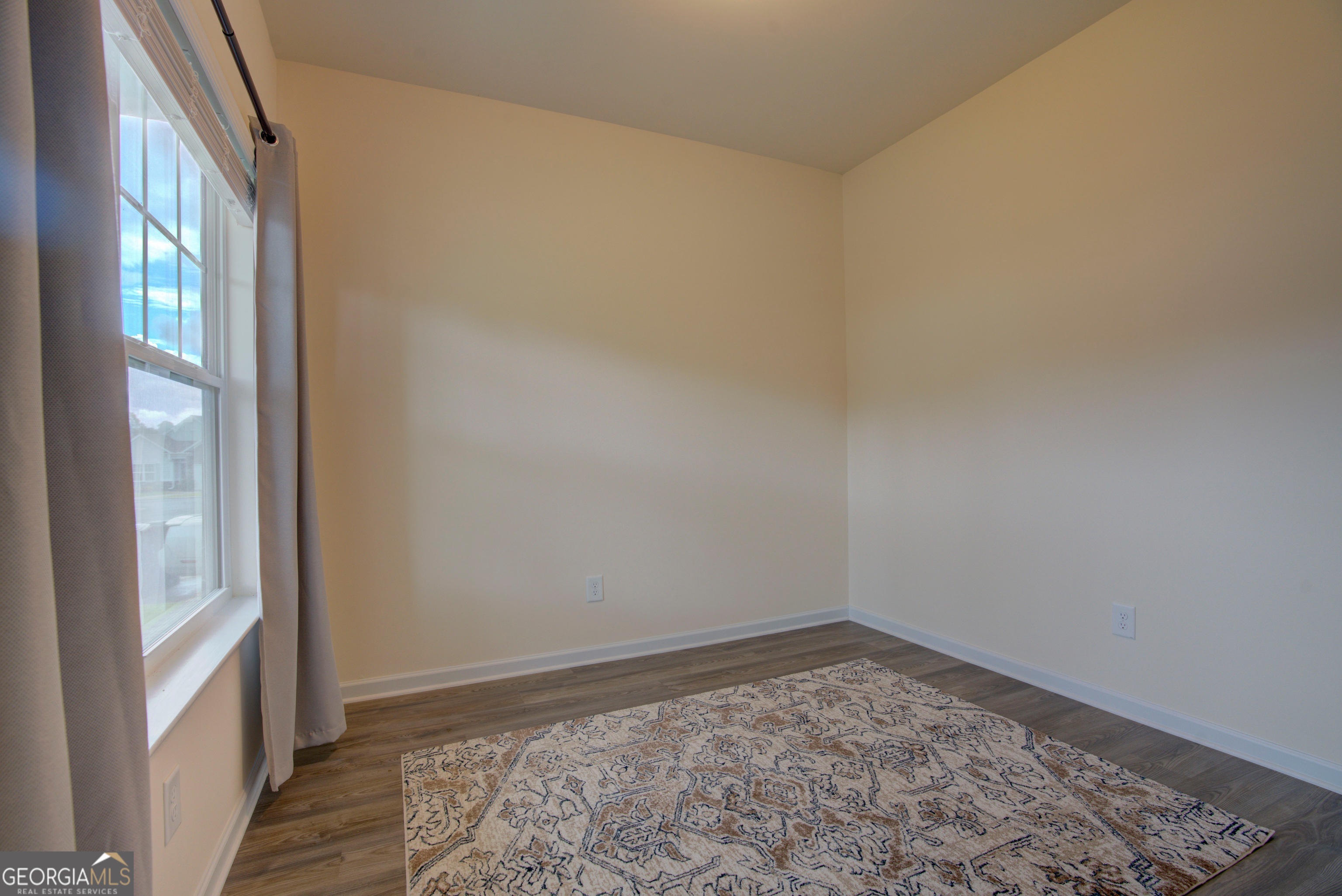 12 Applewood Drive Northeast Rome, GA 30165 - Photo 8 of 31 a big room with wooden floor and windows