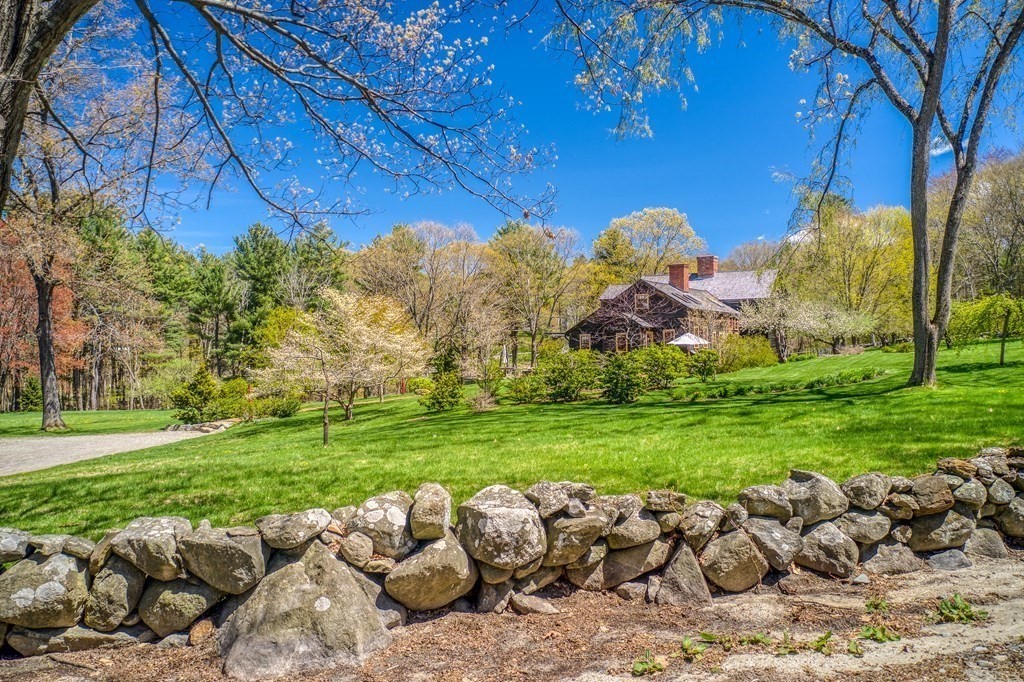 83 Whitney Road Harvard, MA 01451 - Photo 12 of 41 a view of a yard with a large tree