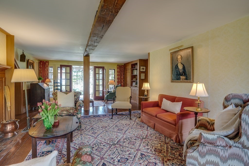 83 Whitney Road Harvard, MA 01451 - Photo 18 of 41 a living room with furniture and a potted plant