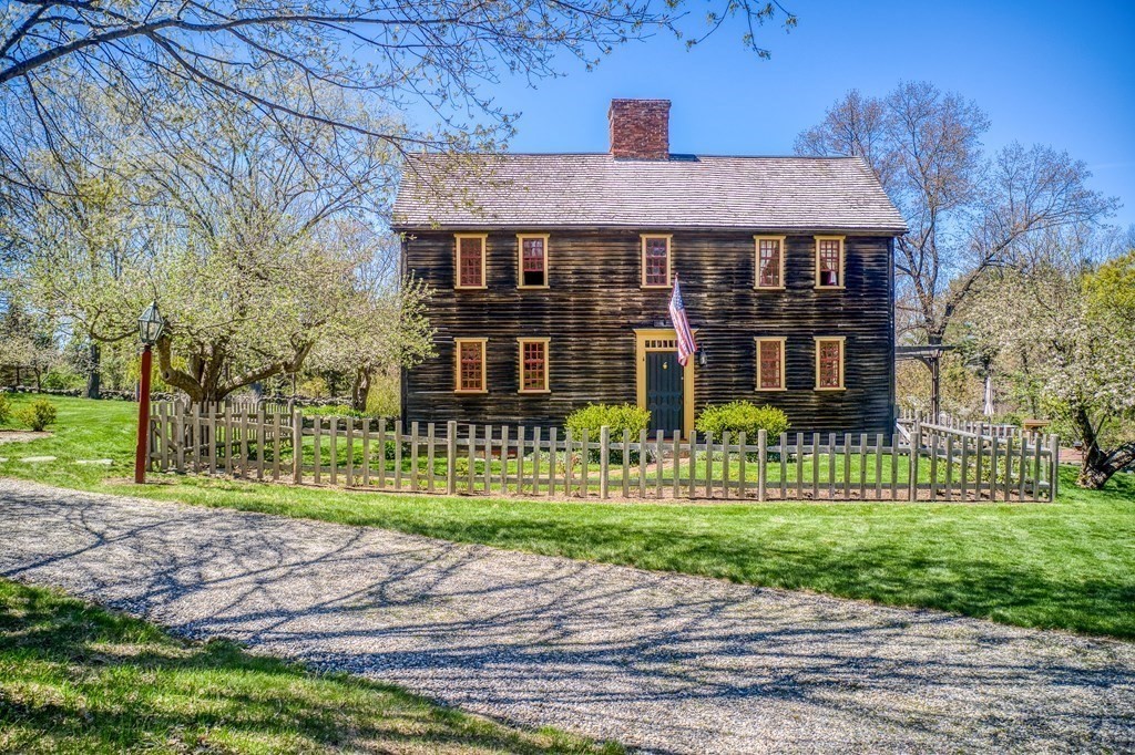 83 Whitney Road Harvard, MA 01451 - Photo 2 of 41 a front view of a house with a yard