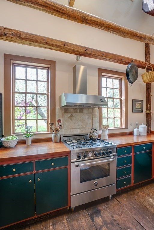 83 Whitney Road Harvard, MA 01451 - Photo 23 of 41 a kitchen with a stove and a sink