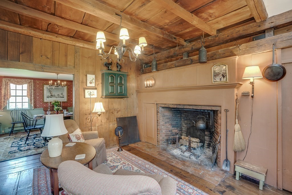 83 Whitney Road Harvard, MA 01451 - Photo 25 of 41 a living room with furniture and a fireplace