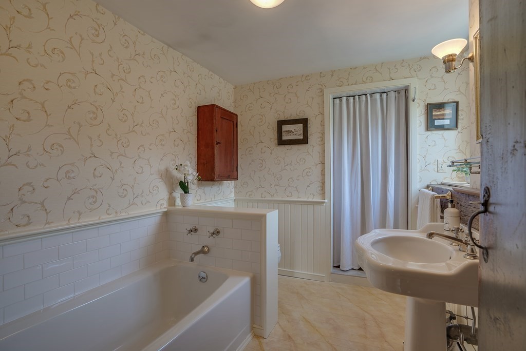 83 Whitney Road Harvard, MA 01451 - Photo 34 of 41 a bathroom with a sink and a bathtub