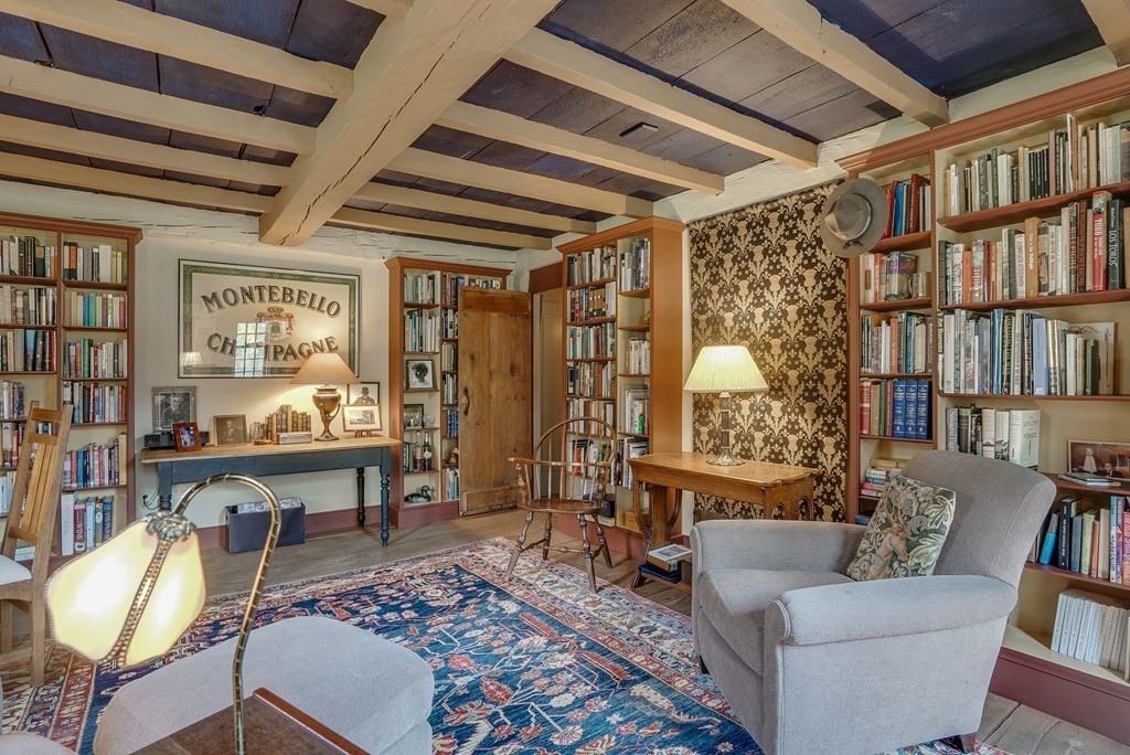 83 Whitney Road Harvard, MA 01451 - Photo 35 of 41 a living room with furniture a rug and a large window