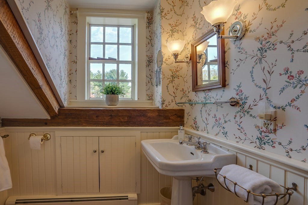 83 Whitney Road Harvard, MA 01451 - Photo 38 of 41 a bathroom with a sink and a mirror