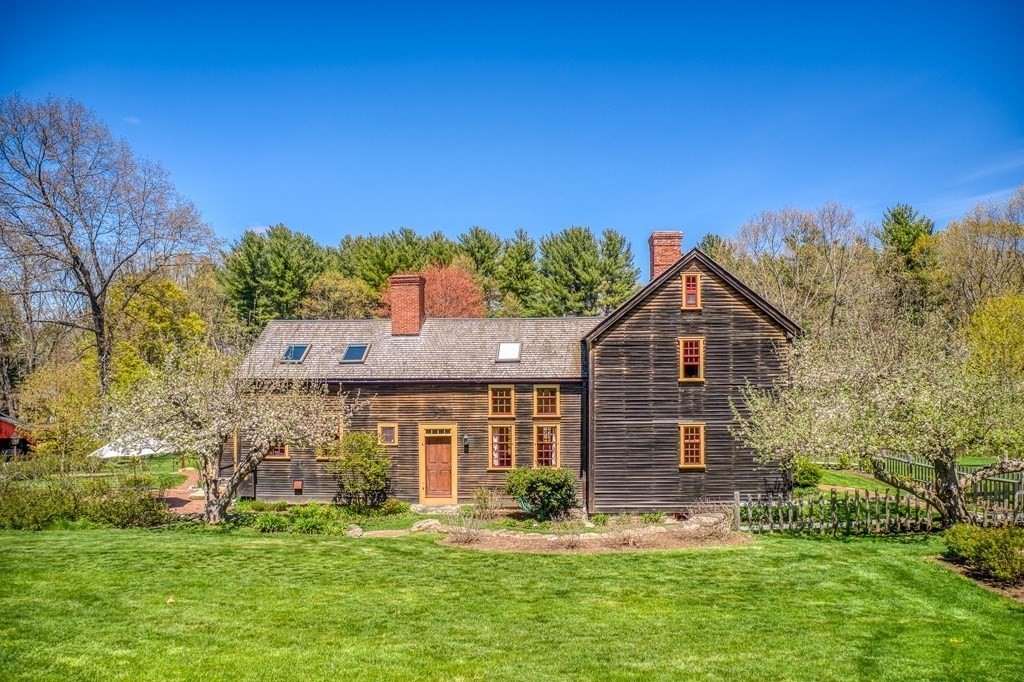 83 Whitney Road Harvard, MA 01451 - Photo 4 of 41 a front view of a house with a yard