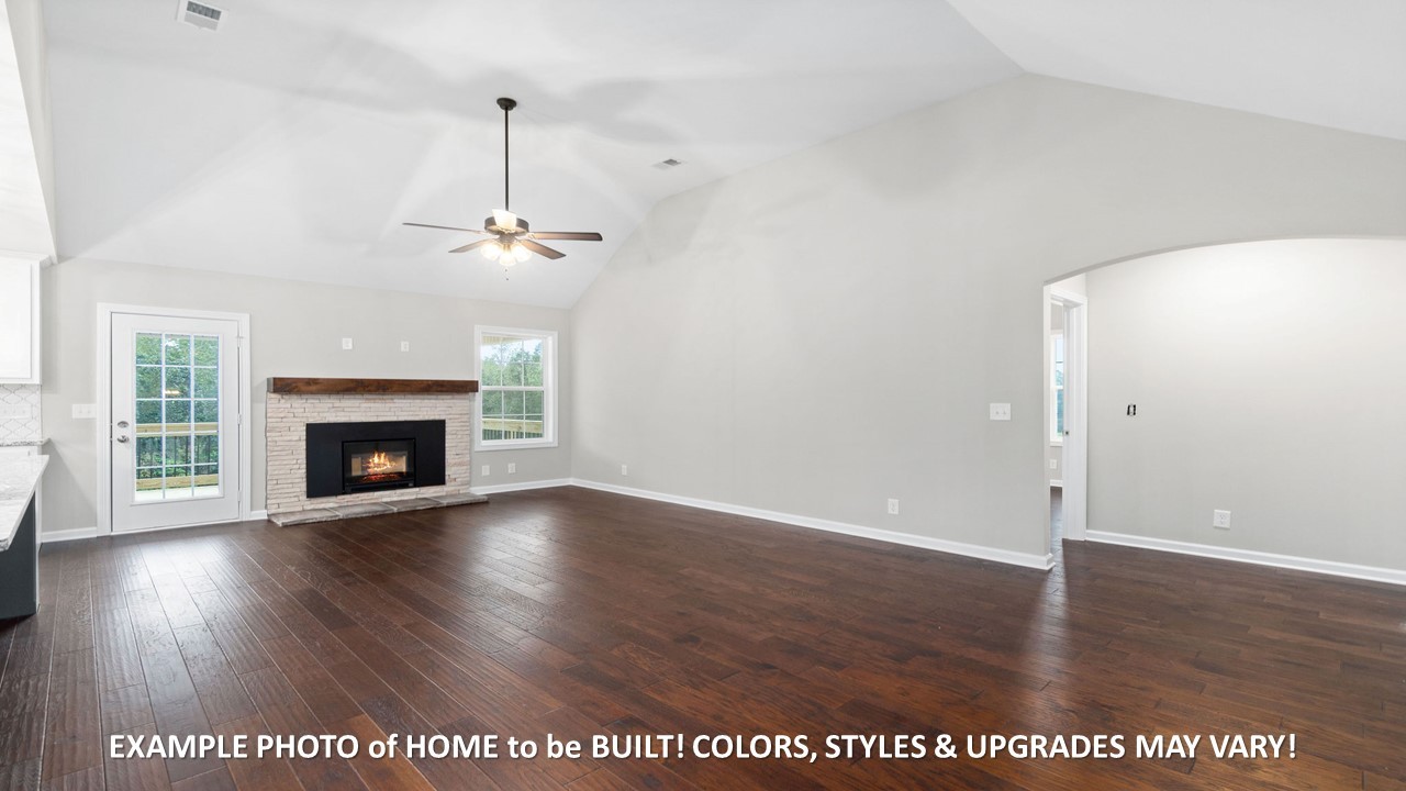 1830 McWhorter Road Cunningham, TN 37052 - Photo 7 of 46 a view of a room with wooden floor and fireplace