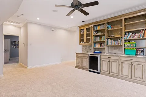 a kitchen with stainless steel appliances granite countertop a stove and cabinets
