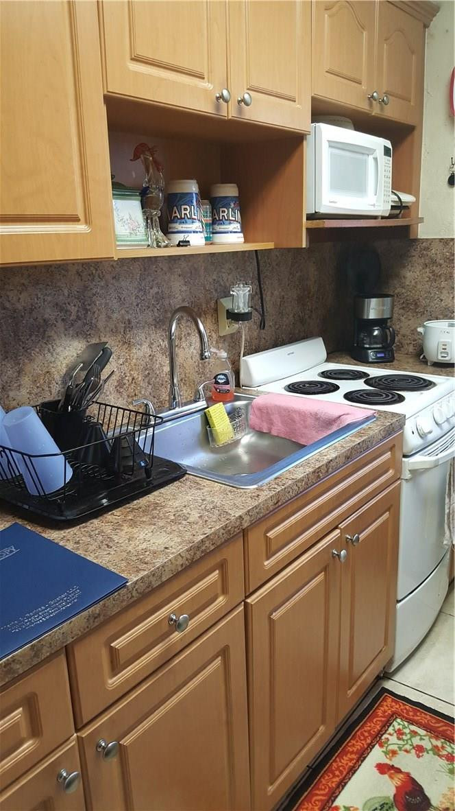 605 West 68th Street, Unit 12A Hialeah, FL 33014 - Photo 1 of 13 Photo 1