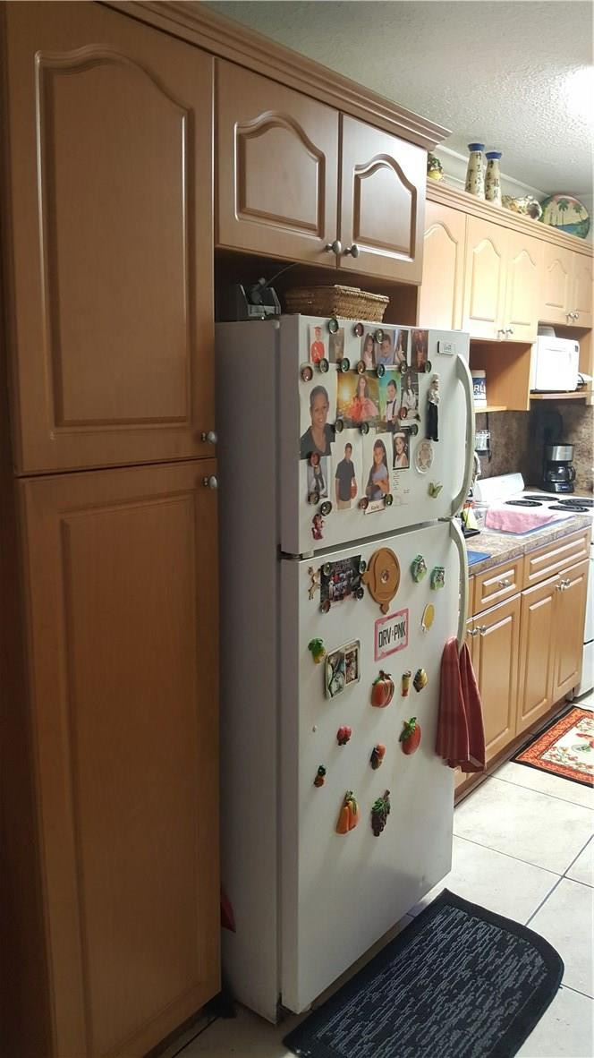 605 West 68th Street, Unit 12A Hialeah, FL 33014 - Photo 5 of 13 Photo 5