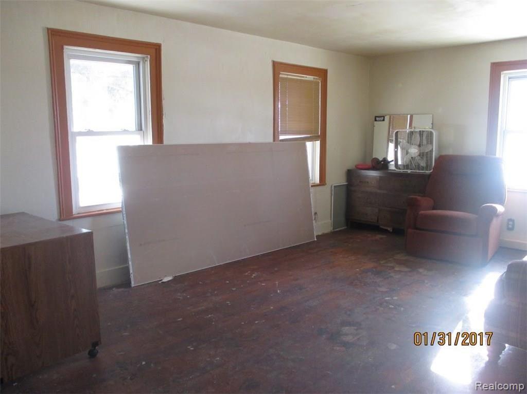 7747 Sayles Road Yale, MI 48097 - Photo 6 of 30 This is a view of the living room.