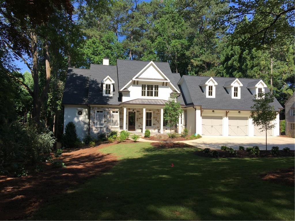3720 North Stratford Road Northeast Atlanta, GA 30342 - Photo 1 of 1 a front view of a house with a garden