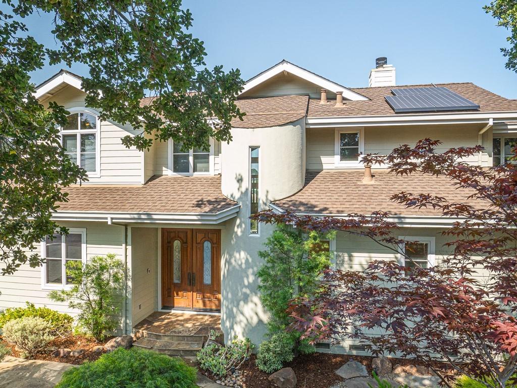 1510 Ridge Road Belmont, CA 94002 - Photo 1 of 55 a front view of a house with garden