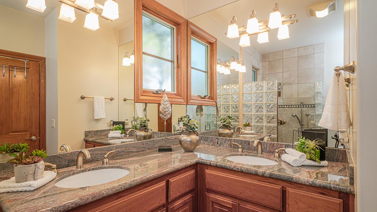1510 Ridge Road Belmont, CA 94002 - Photo 21 of 55 a bathroom with double vanity sinks granite tub and a mirror