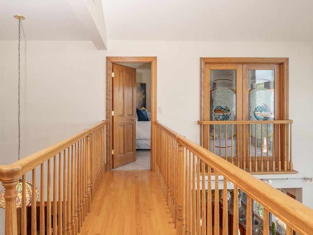 1510 Ridge Road Belmont, CA 94002 - Photo 32 of 55 a view of a hallway with wooden floor and windows