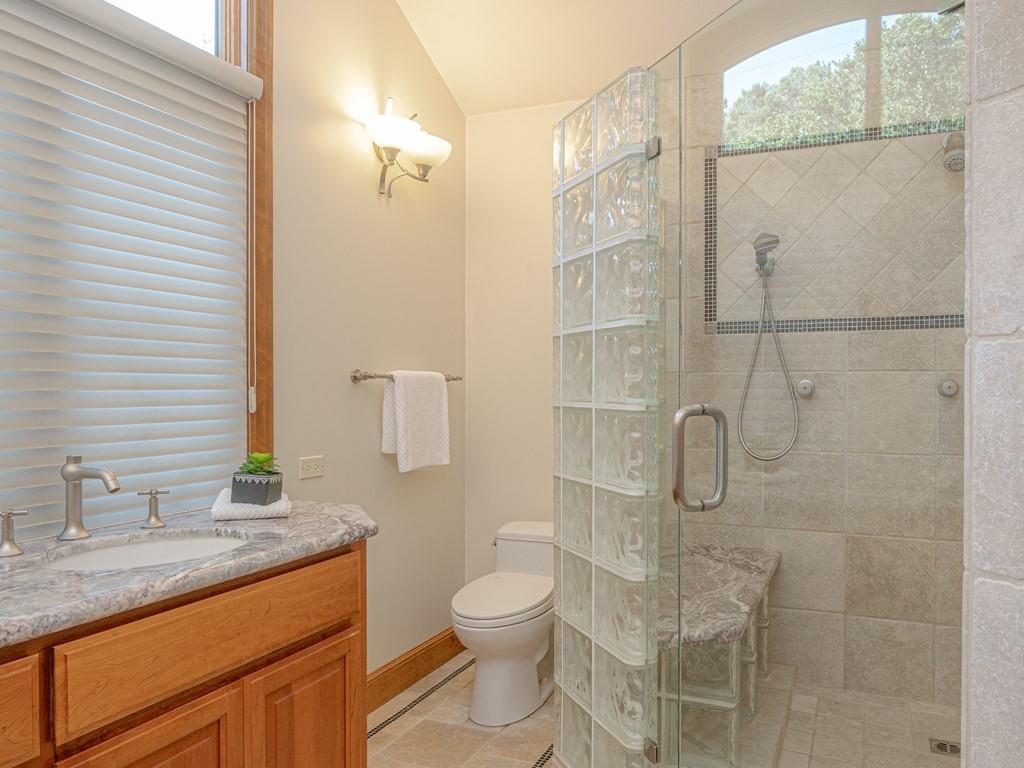 1510 Ridge Road Belmont, CA 94002 - Photo 41 of 55 a bathroom with a granite countertop sink toilet and shower