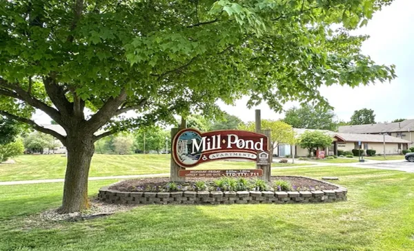 a sign on the side of a road