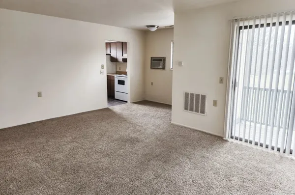 an empty room with windows