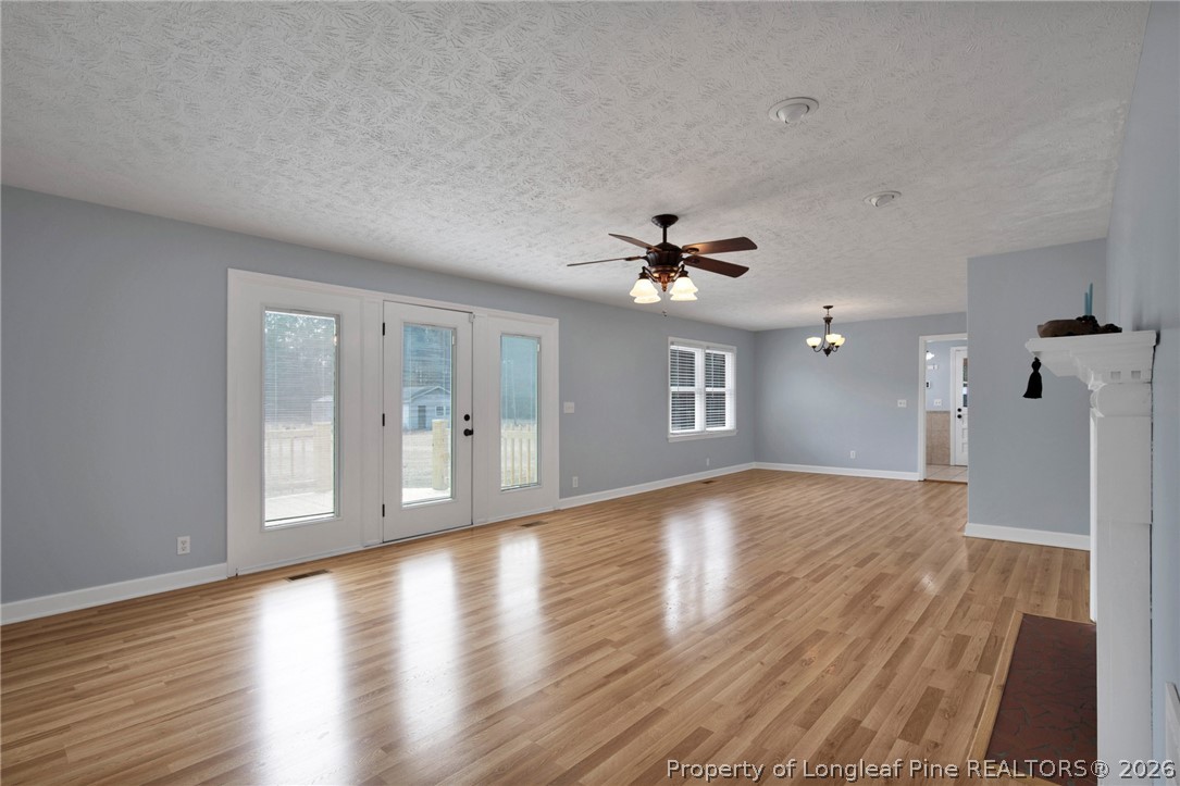 1064 Bainbridge Road Stedman, NC 28391 - Photo 18 of 46 a view of livingroom and hardwood floor