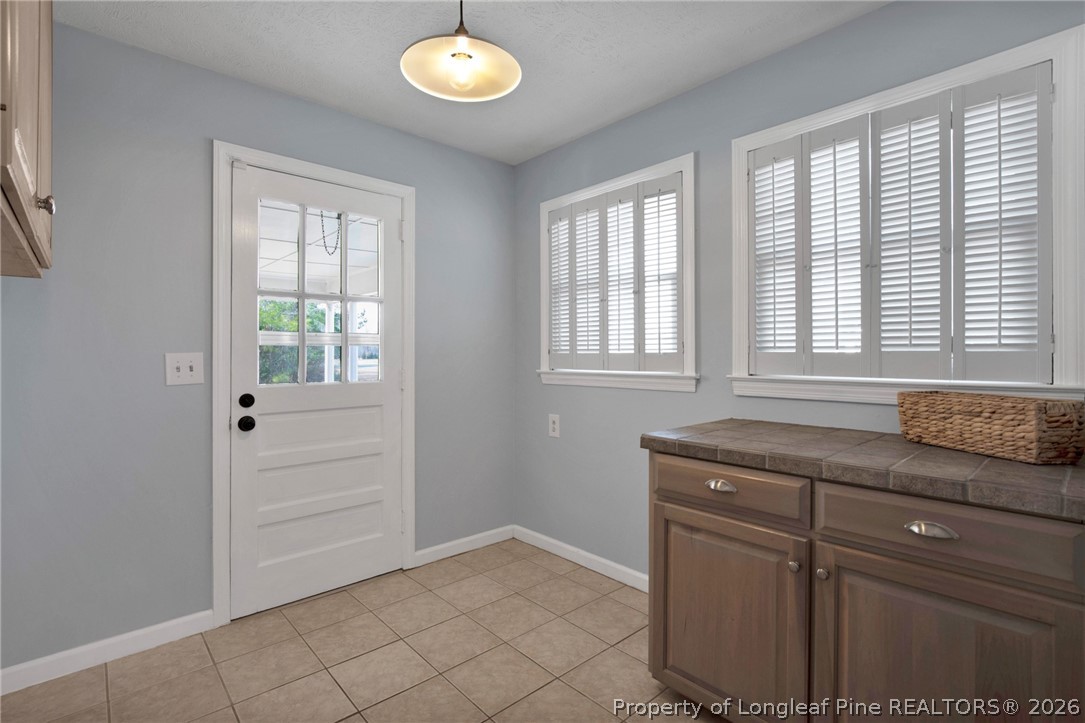 1064 Bainbridge Road Stedman, NC 28391 - Photo 20 of 46 an empty room with windows