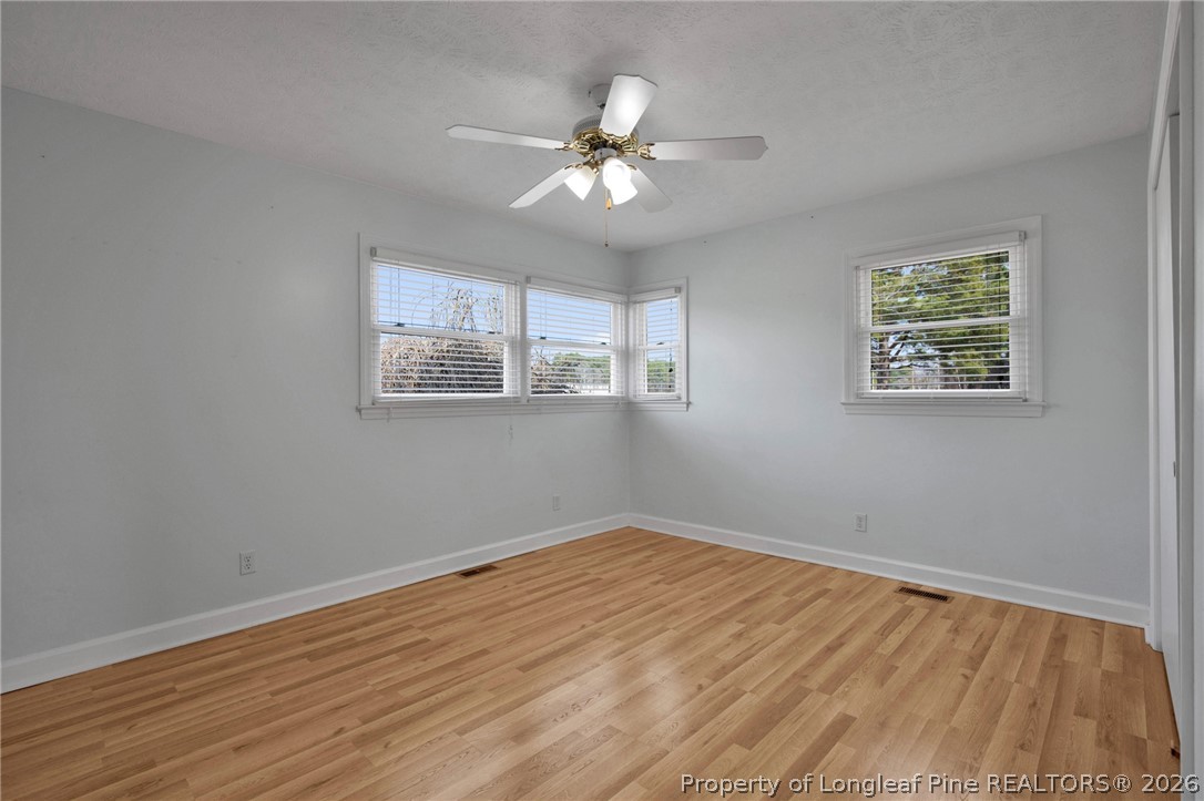 1064 Bainbridge Road Stedman, NC 28391 - Photo 27 of 46 a view of a room with wooden floor and window
