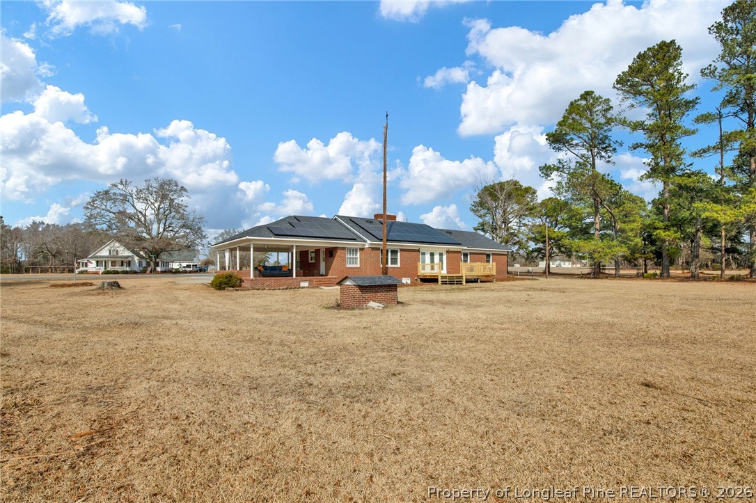 1064 Bainbridge Road Stedman, NC 28391 - Photo 37 of 46 a view of a house with a yard