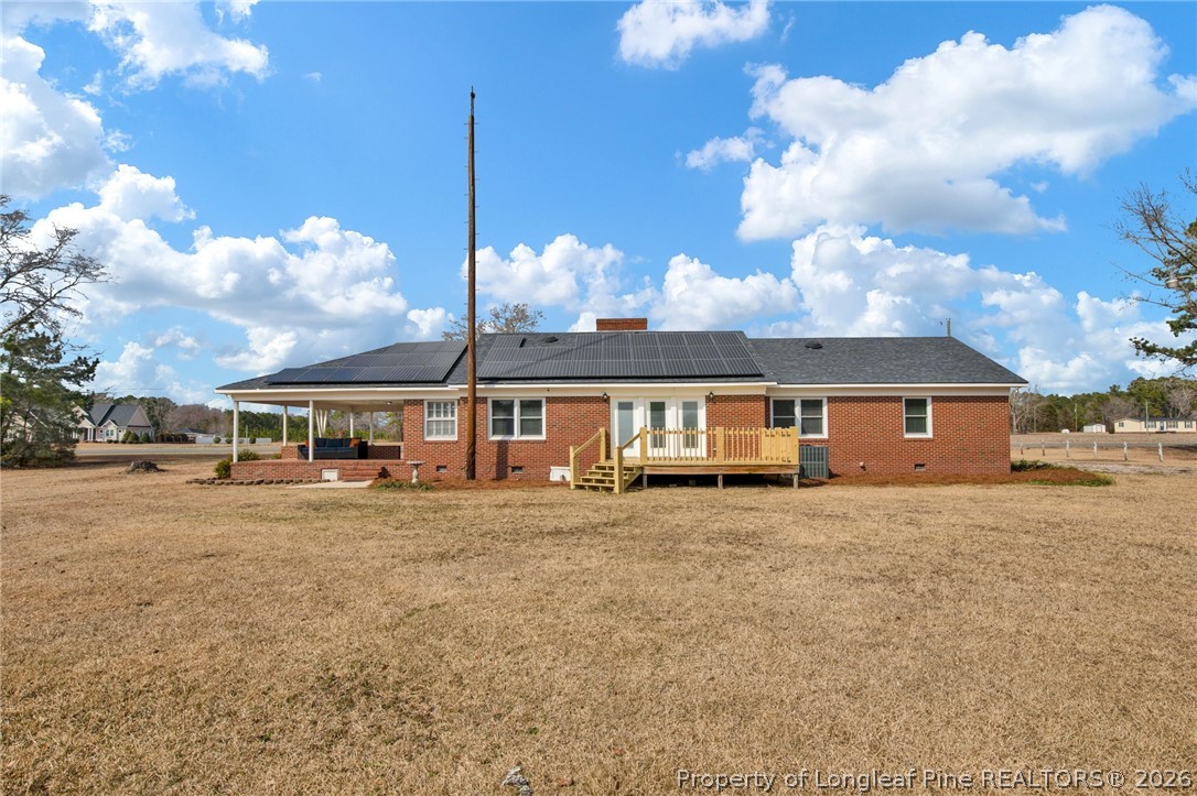 1064 Bainbridge Road Stedman, NC 28391 - Photo 38 of 46 a view of a house with a big yard