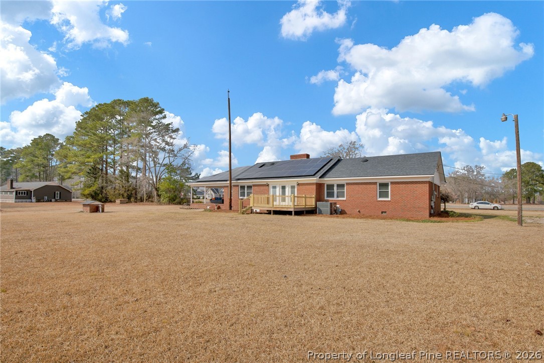 1064 Bainbridge Road Stedman, NC 28391 - Photo 39 of 46 a front view of a house with a yard and garage