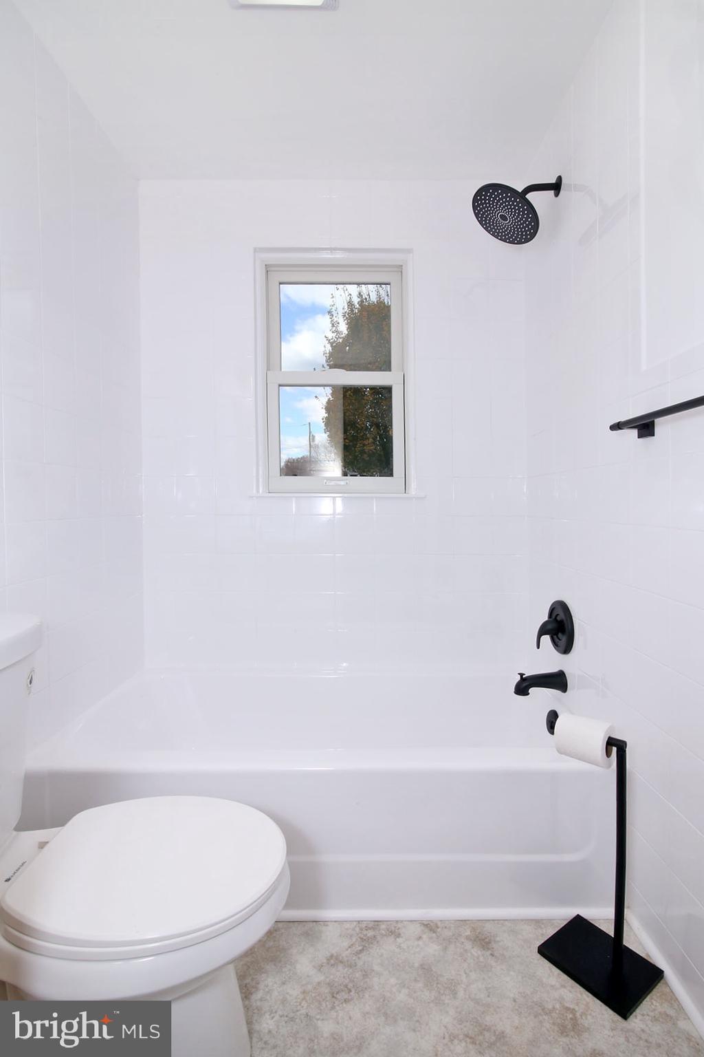 1011 State Drive Lebanon, PA 17042 - Photo 16 of 34 a bathroom with a toilet and a shower