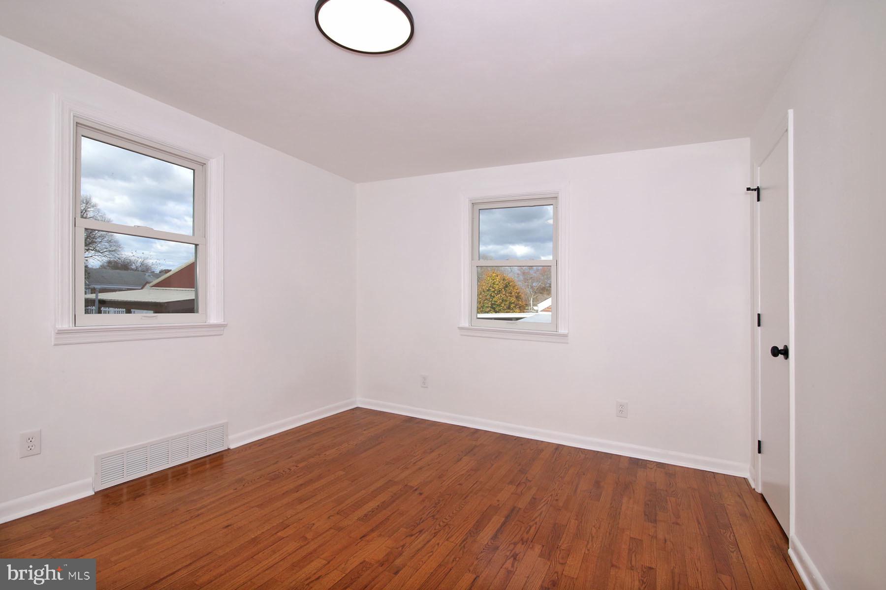 1011 State Drive Lebanon, PA 17042 - Photo 18 of 34 a view of empty room with wooden floor and fan