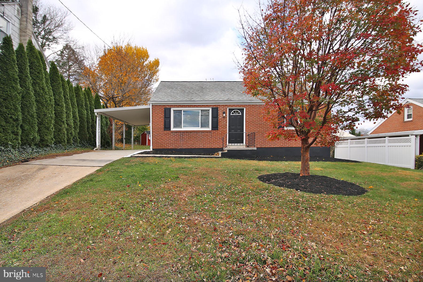 1011 State Drive Lebanon, PA 17042 - Photo 3 of 34 a front view of a house with garden