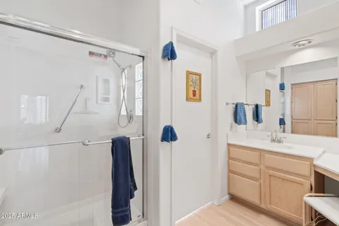 a view of a room with workspace and windows