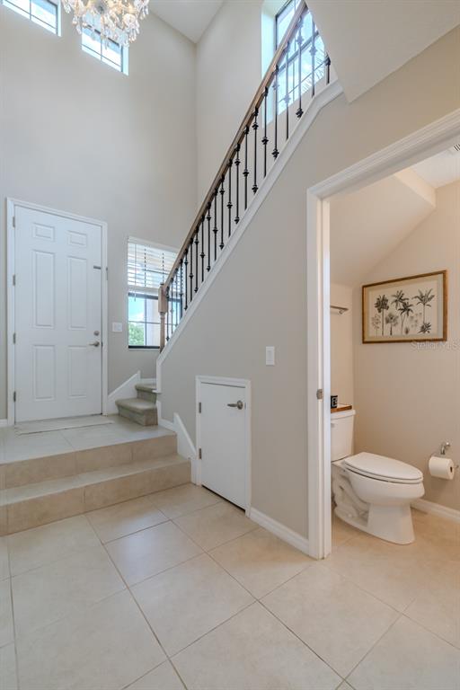 4730 Wandering Way Wesley Chapel, FL 33544 - Photo 11 of 61 a view of entryway with bathroom and shower