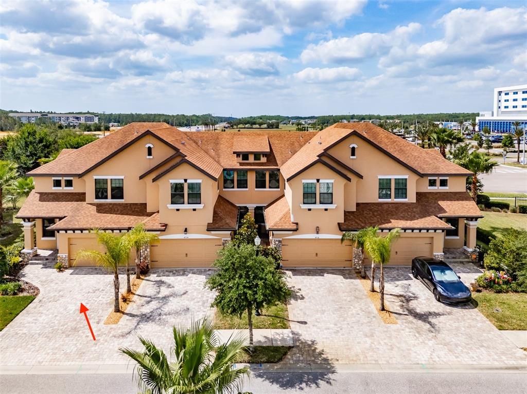 4730 Wandering Way Wesley Chapel, FL 33544 - Photo 43 of 61 an aerial view of a house with swimming pool and sitting area