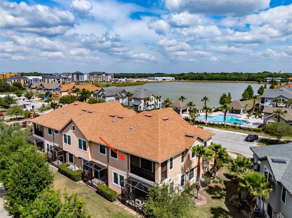 4730 Wandering Way Wesley Chapel, FL 33544 - Photo 51 of 61 a view of a city with lawn chairs and large trees