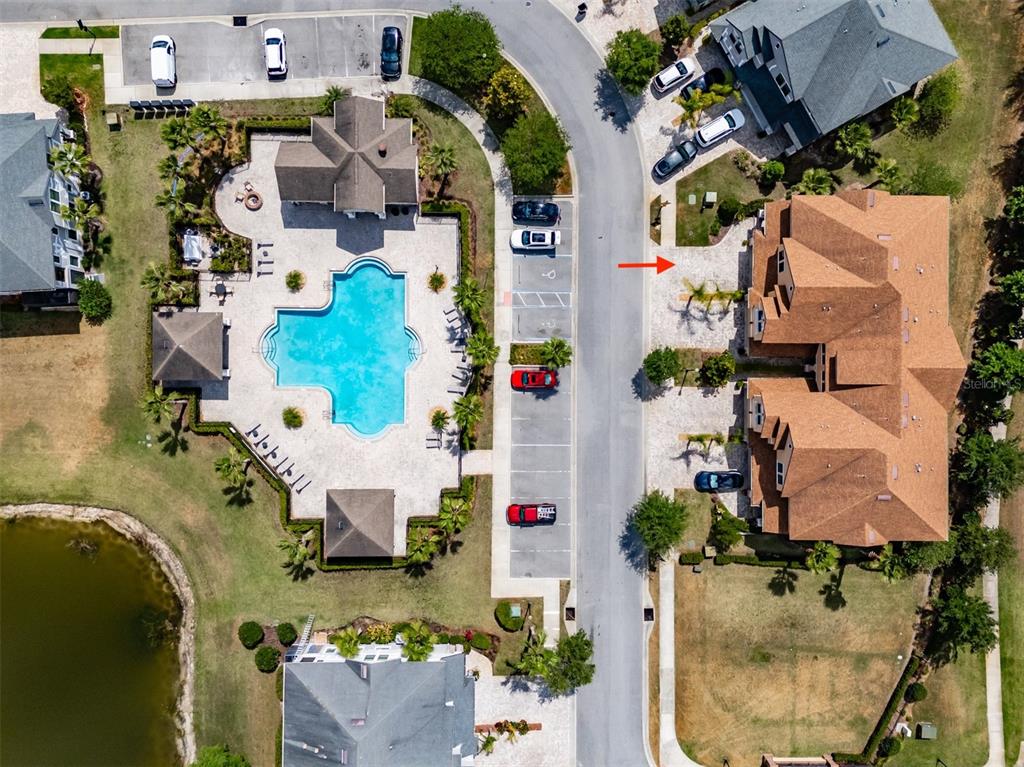 4730 Wandering Way Wesley Chapel, FL 33544 - Photo 60 of 61 an aerial view of residential houses with outdoor space and parking