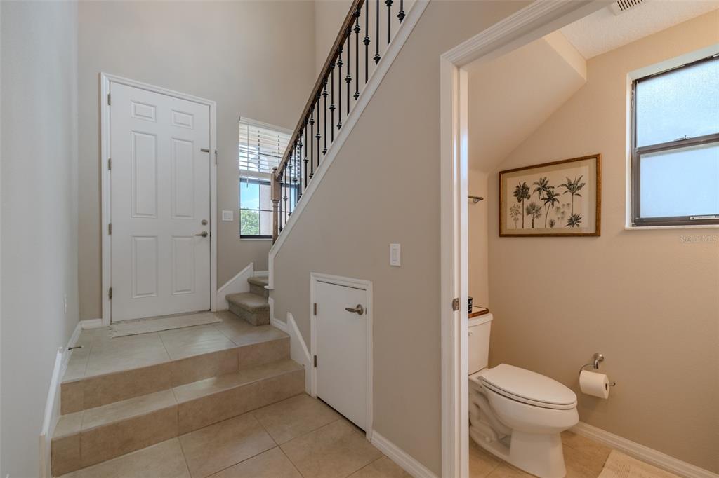 4730 Wandering Way Wesley Chapel, FL 33544 - Photo 10 of 61 a bathroom with a toilet and a shower