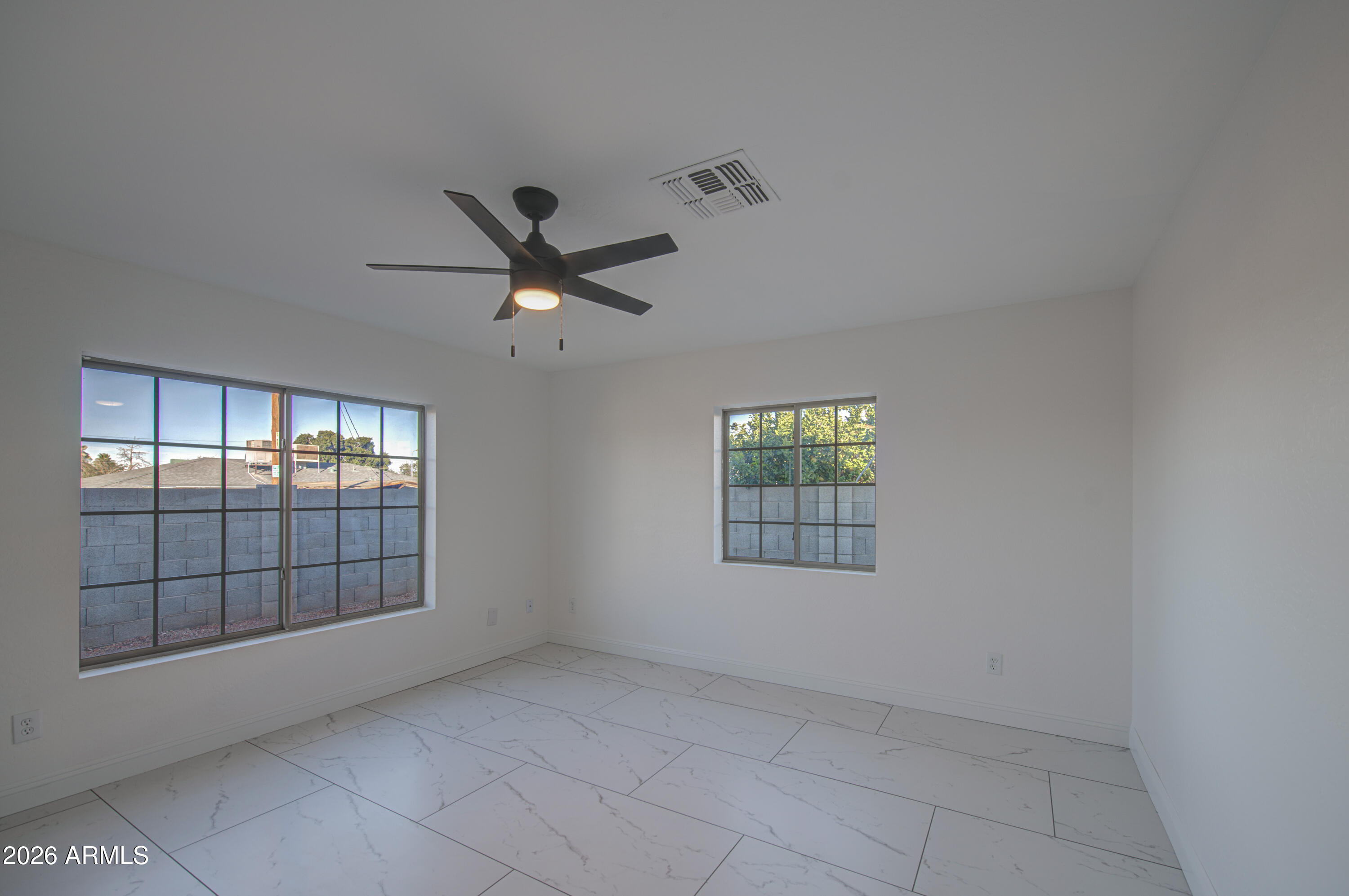 2302 East Alta Vista Road Phoenix, AZ 85042 - Photo 18 of 28 Primary Bed 1