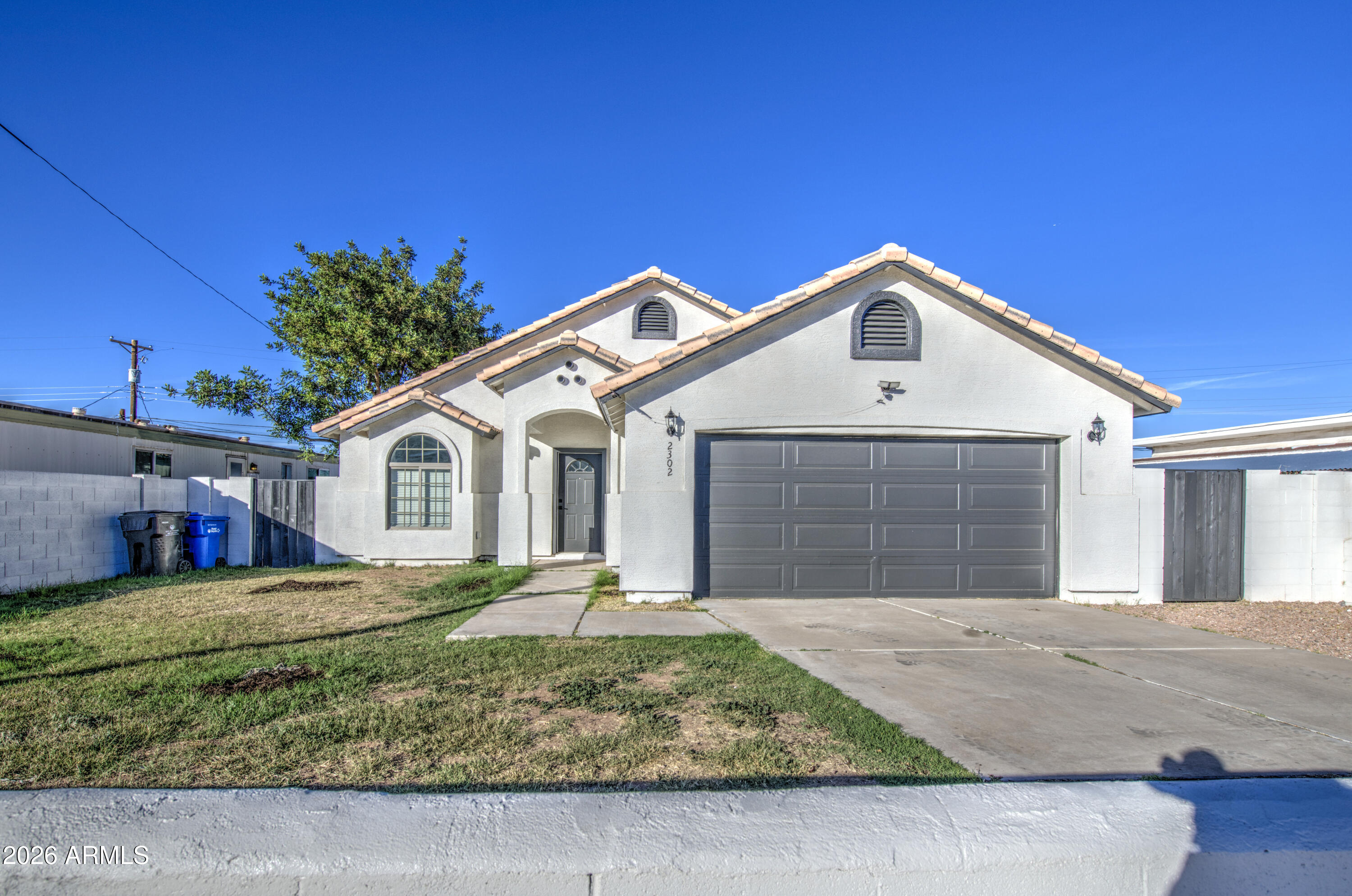 2302 East Alta Vista Road Phoenix, AZ 85042 - Photo 2 of 28 Front 2